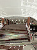 Станция метро "Митино"  Выход в город из последнего вагона при движении поезда из центра на ул. Митинская и Дубравная, к кинотеатру "Люксор".